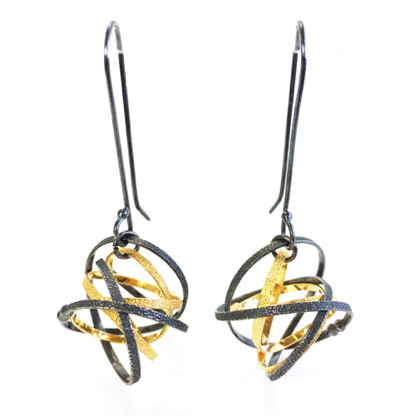 Mobius Mixed Long Drop Earring 

Oxidized silver, 22K gold vermeil
ERDR16L-G-OX